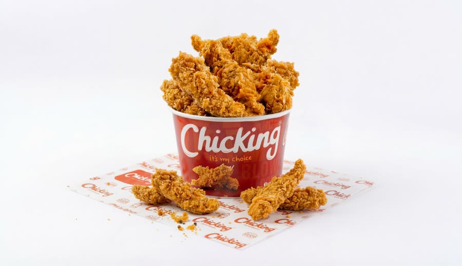 A bucket of crispy boneless chicken strips